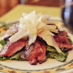 Tagliata di Manzo con Rucola e Grana